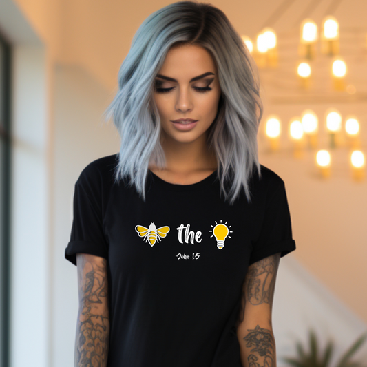 "Bee the Light" Jesus Shirt – Scripture T-Shirt for Men and Women Light and Cheerful Bee & Light Bulb Tee, Inspirational Gift, Summer Fashion, Nature Lover Shirt, Fun Daily Wear, Versatile Casual Top
